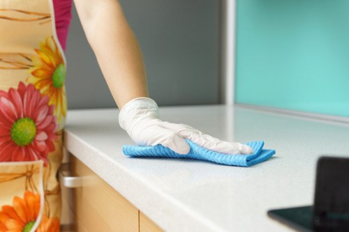 Carpet cleaning technician preparing equipment safely