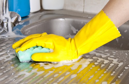 Carpet cleaning technician preparing equipment before a service booking