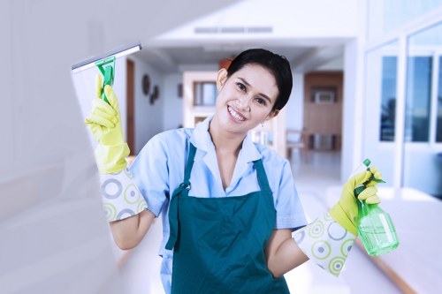 Technician handling carpet cleaning work with safety precautions